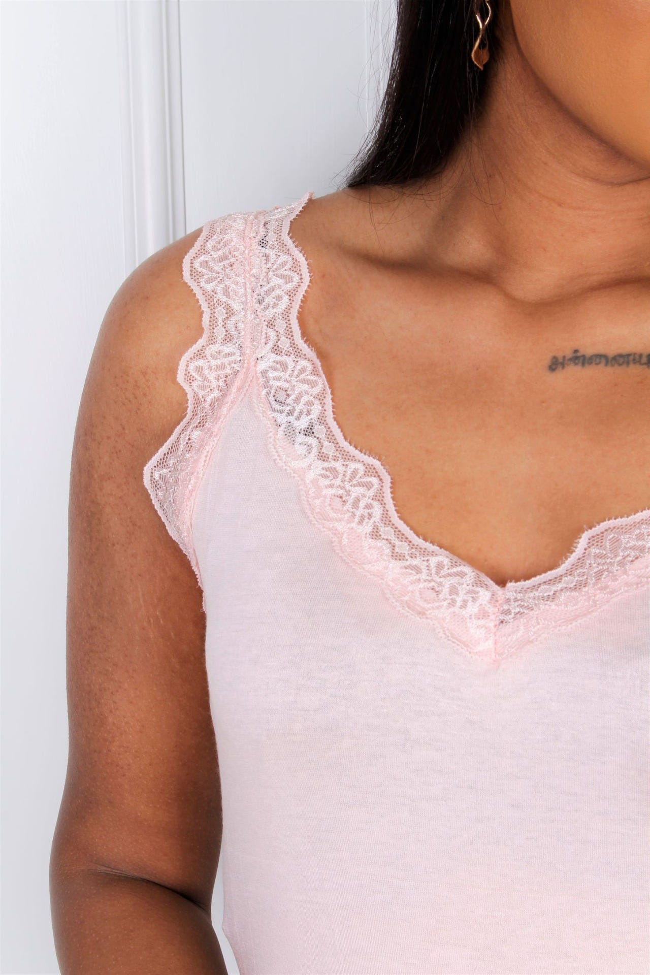Lang top med blonde, rosa